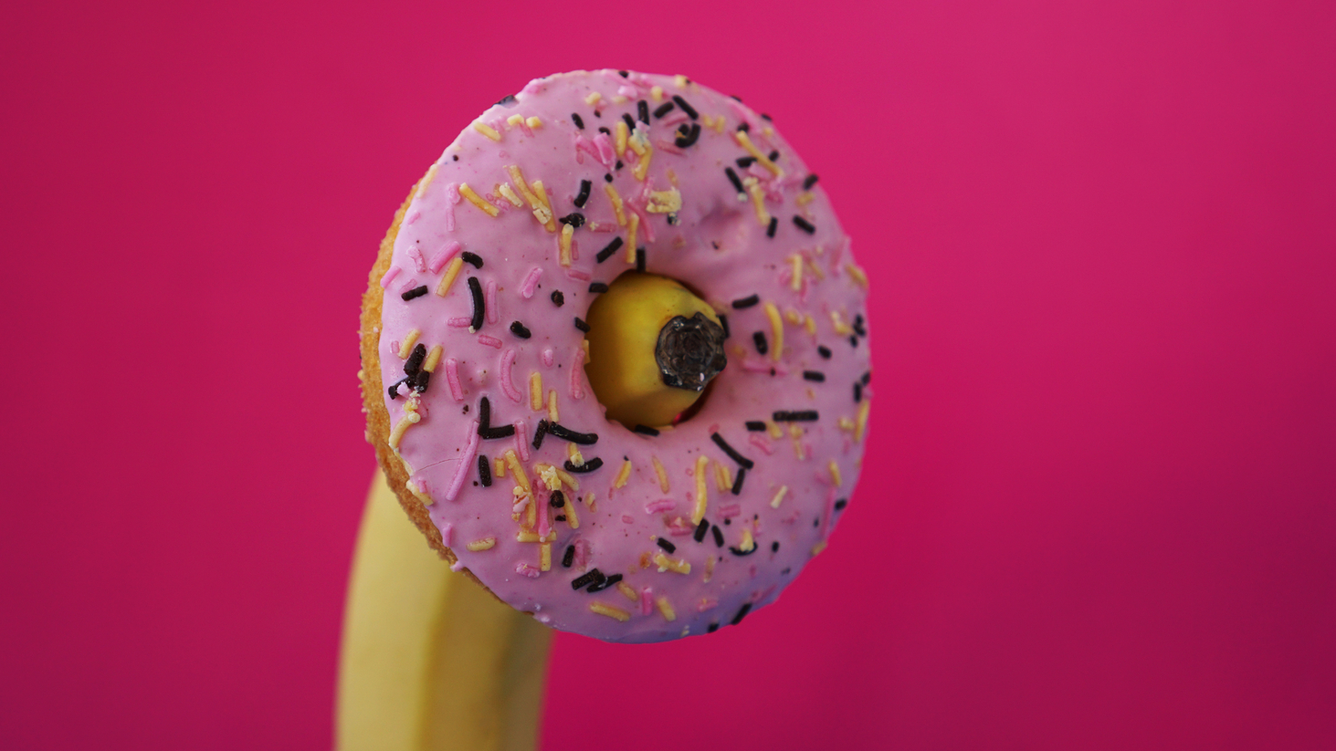Sweet,Donut,And,Banana,On,Pink,Color,Background.,Sex,And